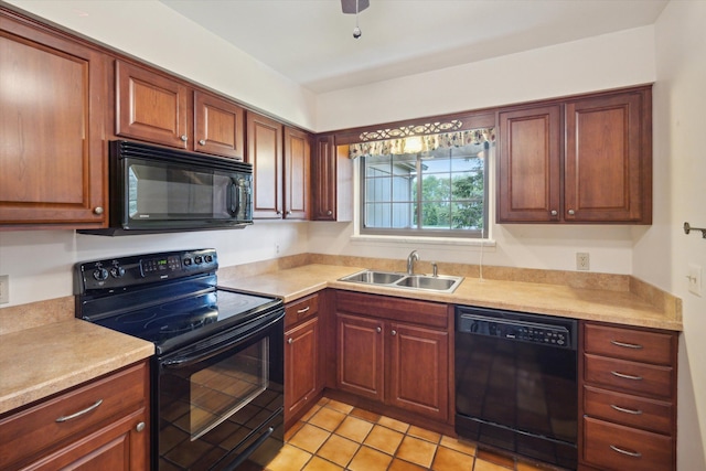11928 Shenandoah Unit 3, South Lyon, MI 48178 - kitchen featuring black appliances, a sink, light countertops, and light tile patterned floors