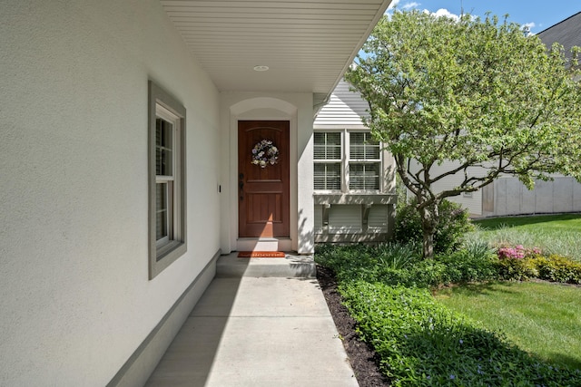 416 Enclave Ct SE Unit 2, Grand Rapids, MI 49546 - property entrance with stucco siding