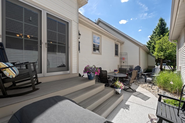 416 Enclave Ct SE Unit 2, Grand Rapids, MI 49546 - view of patio featuring outdoor dining space