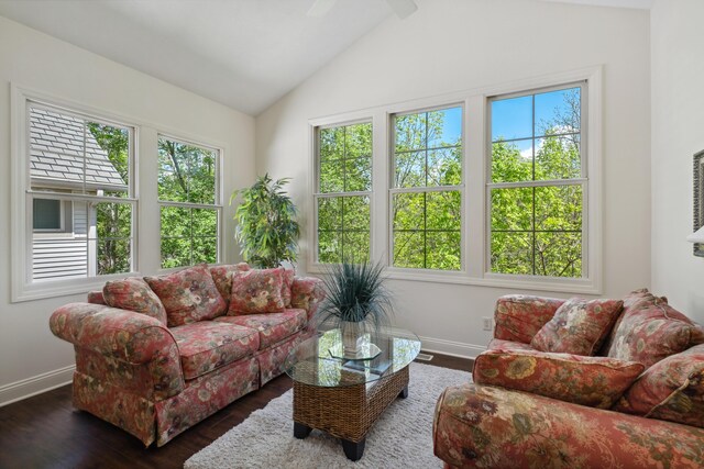 416 Enclave Ct SE Unit 2, Grand Rapids, MI 49546 - living area featuring healthy amount of natural light, dark wood finished floors, baseboards, and lofted ceiling