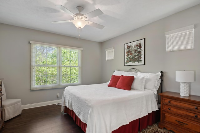 416 Enclave Ct SE Unit 2, Grand Rapids, MI 49546 - bedroom with baseboards, dark wood-type flooring, and a ceiling fan