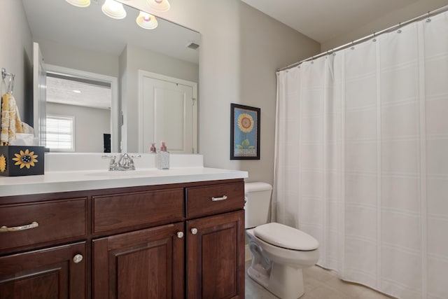 416 Enclave Ct SE Unit 2, Grand Rapids, MI 49546 - bathroom featuring toilet, vanity, tile patterned flooring, and a shower with curtain