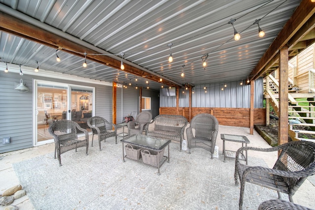 282 Evans Trl, Tipton, MI 49287 - view of patio with an outdoor living space and stairway