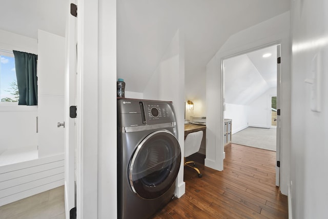 282 Evans Trl, Tipton, MI 49287 - washroom featuring washer / clothes dryer, hardwood / wood-style floors, and baseboards