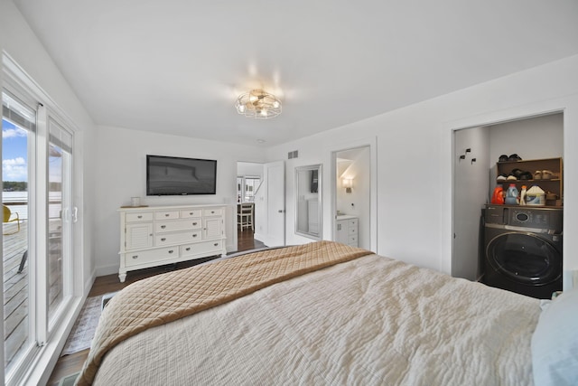 282 Evans Trl, Tipton, MI 49287 - bedroom with washer / dryer, dark wood-style flooring, baseboards, ensuite bath, and access to outside
