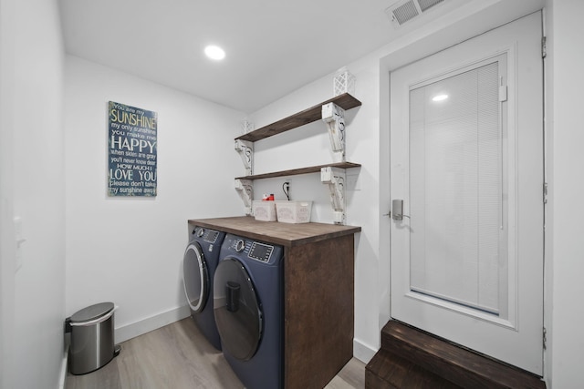 282 Evans Trl, Tipton, MI 49287 - laundry room featuring washing machine and clothes dryer, light wood-type flooring, baseboards, and recessed lighting