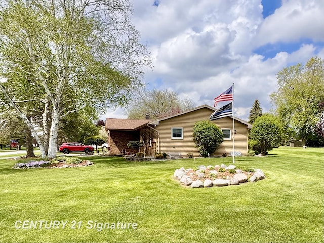 2880 Wurtzel Dr, Freeland, MI 48623 - view of home's exterior with a lawn