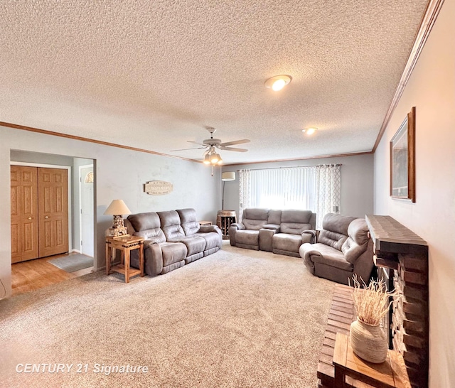 2880 Wurtzel Dr, Freeland, MI 48623 - living room featuring ornamental molding, a ceiling fan, carpet floors, and a textured ceiling
