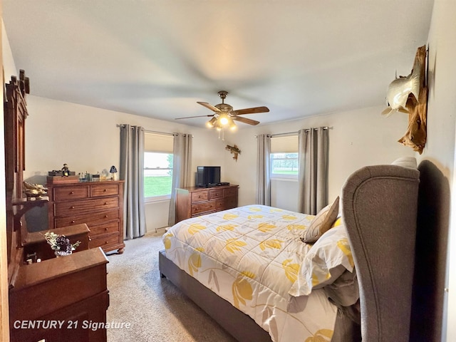 2880 Wurtzel Dr, Freeland, MI 48623 - bedroom with multiple windows, light colored carpet, and ceiling fan
