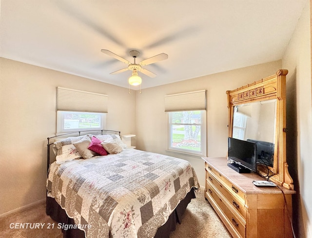2880 Wurtzel Dr, Freeland, MI 48623 - bedroom featuring light carpet, a ceiling fan, and baseboards