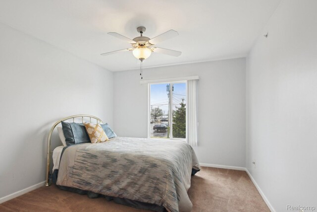 781 2nd St Unit 61, Wyandotte, MI 48192 - bedroom with carpet, baseboards, and ceiling fan