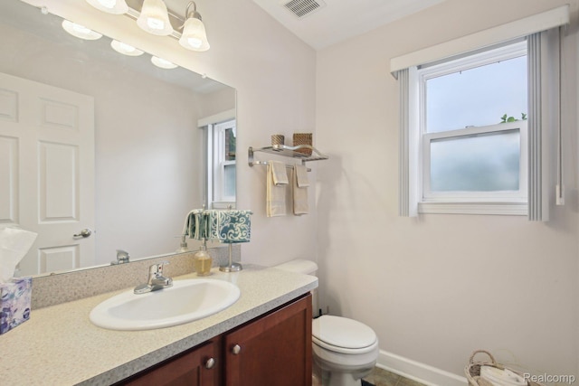 781 2nd St Unit 61, Wyandotte, MI 48192 - bathroom with vanity and toilet