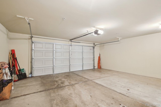 781 2nd St Unit 61, Wyandotte, MI 48192 - garage with a garage door opener