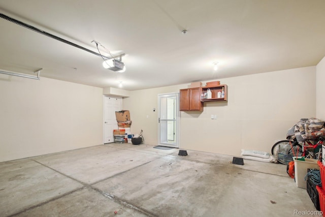 781 2nd St Unit 61, Wyandotte, MI 48192 - garage featuring a garage door opener