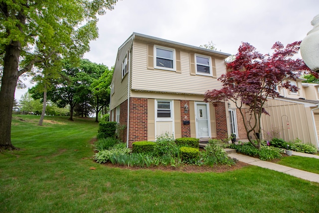 1522 Brentwood Dr, Troy, MI 48098 - colonial house with brick siding and a front yard