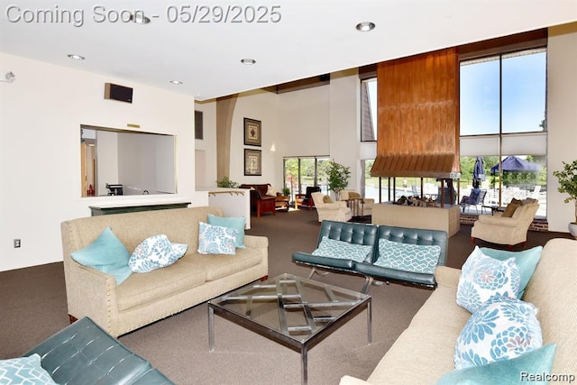 1522 Brentwood Dr, Troy, MI 48098 - living area with a high ceiling, carpet floors, and recessed lighting