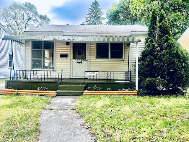 20760 Atlantic Ave, Warren, MI 48091 - bungalow-style house featuring a porch and roof with shingles