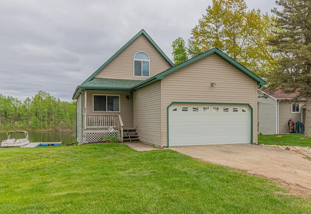 11417 Pinecrest Dr, Canadian Lakes, MI 49346 - view of front of house featuring driveway, a front lawn, and an attached garage