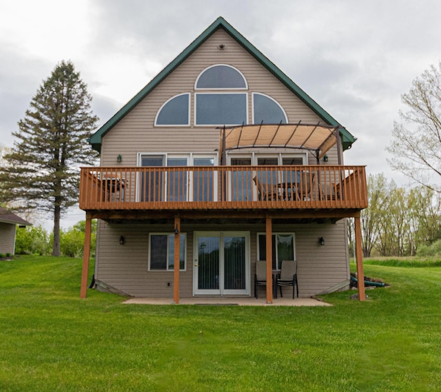 11417 Pinecrest Dr, Canadian Lakes, MI 49346 - rear view of house featuring a yard, a patio, and a deck