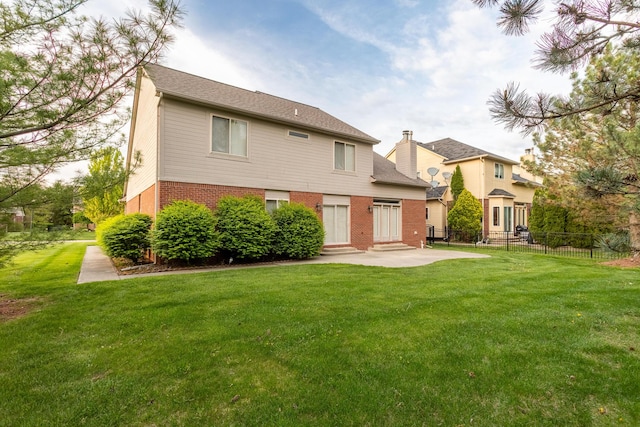 17280 Breckenridge Dr, Clinton Township, MI 48038 - rear view of house with brick siding and a patio