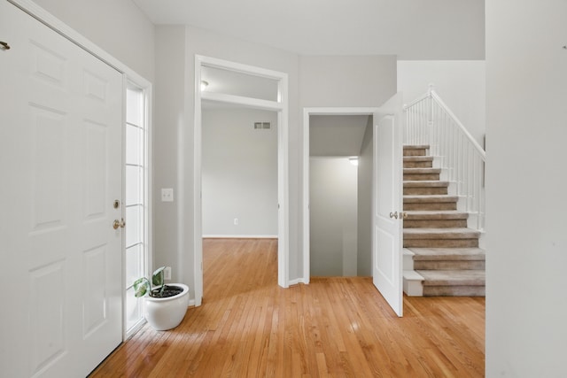 17280 Breckenridge Dr, Clinton Township, MI 48038 - entrance foyer featuring light wood-type flooring and stairs