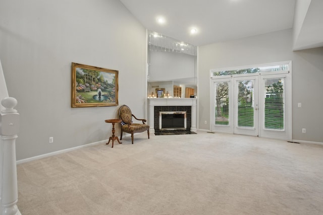 17280 Breckenridge Dr, Clinton Township, MI 48038 - living room with high vaulted ceiling, carpet floors, baseboards, and a tile fireplace
