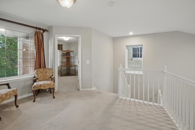 17280 Breckenridge Dr, Clinton Township, MI 48038 - living area featuring carpet floors, an upstairs landing, and baseboards
