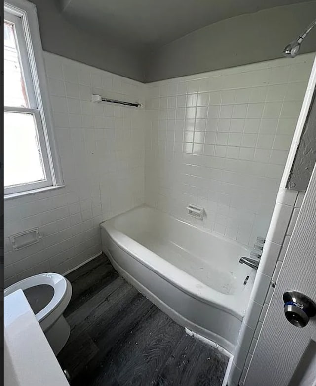 8855 Vaughan St, Detroit, MI 48228 - full bath with toilet, wood finished floors, bathtub / shower combination, and tile walls