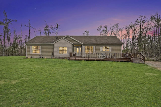 19378 Hackett Lake Highway, Onaway, MI 49765 - rear view of property with a wooden deck, a yard, and a shingled roof