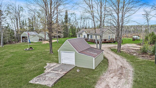 19378 Hackett Lake Highway, Onaway, MI 49765 - view of outdoor structure featuring driveway and an outdoor structure