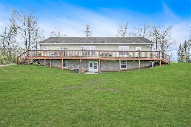 19378 Hackett Lake Highway, Onaway, MI 49765 - back of house with a wooden deck, a yard, and stairs