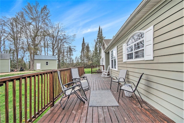 19378 Hackett Lake Highway, Onaway, MI 49765 - deck featuring a yard