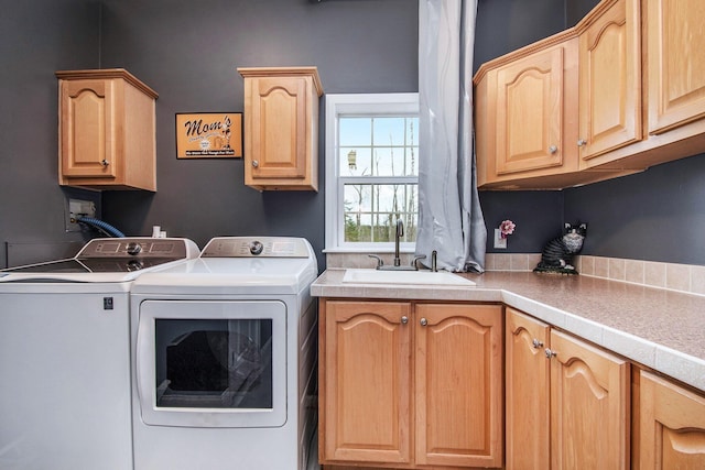 19378 Hackett Lake Highway, Onaway, MI 49765 - clothes washing area with independent washer and dryer and cabinet space