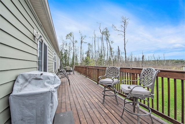 19378 Hackett Lake Highway, Onaway, MI 49765 - deck with a grill