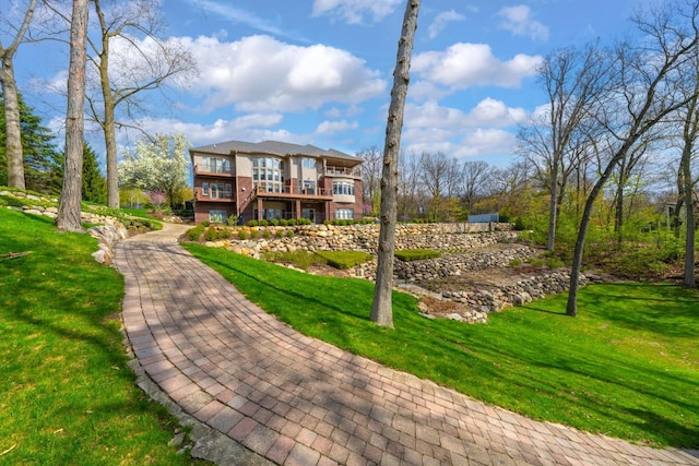 5001 Forest Vly, Clarkston, MI 48348 - back of house featuring a lawn and a wooden deck