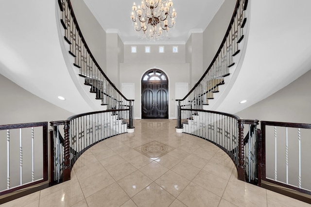 5001 Forest Vly, Clarkston, MI 48348 - tiled foyer featuring a chandelier, a towering ceiling, baseboards, stairs, and crown molding
