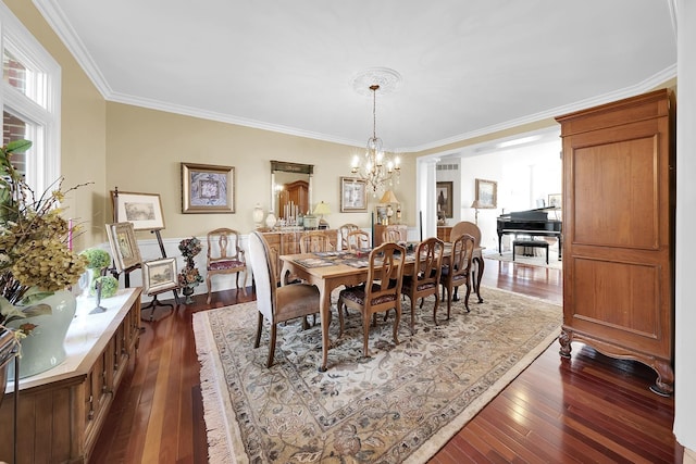 5001 Forest Vly, Clarkston, MI 48348 - dining area featuring dark wood-style floors, ornamental molding, and a chandelier