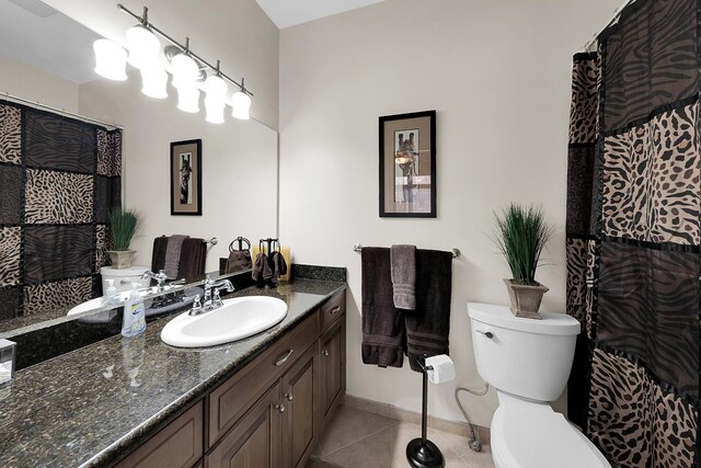 5001 Forest Vly, Clarkston, MI 48348 - bathroom with tile patterned floors, toilet, vanity, a shower with shower curtain, and baseboards