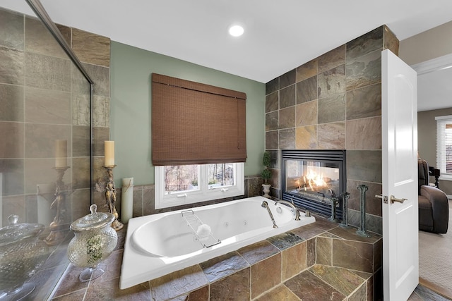 5001 Forest Vly, Clarkston, MI 48348 - full bath with a tub with jets, a fireplace, and tiled shower