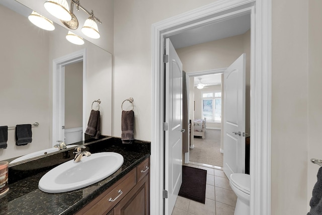 5001 Forest Vly, Clarkston, MI 48348 - ensuite bathroom with toilet, tile patterned floors, and vanity