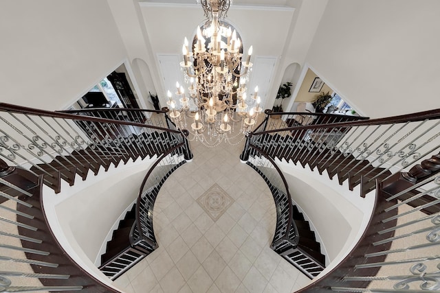 5001 Forest Vly, Clarkston, MI 48348 - stairway featuring a towering ceiling and a chandelier