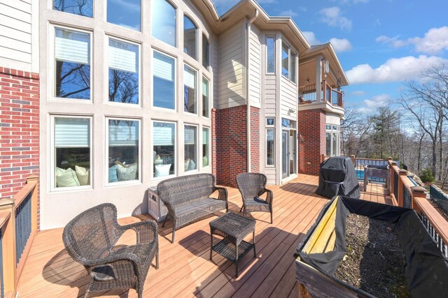 5001 Forest Vly, Clarkston, MI 48348 - deck with outdoor lounge area and a grill