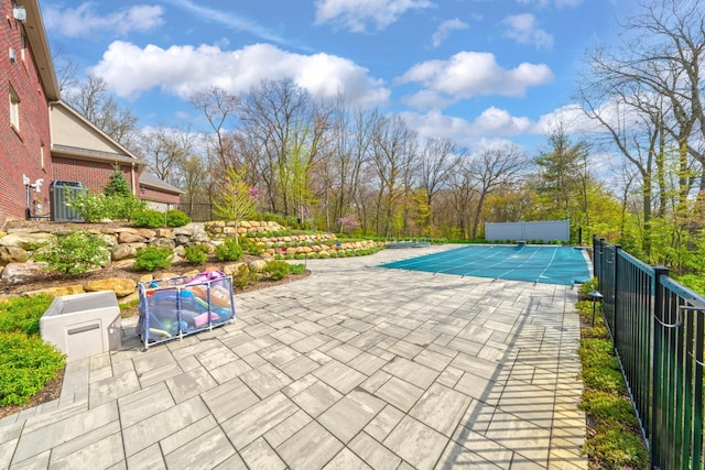 5001 Forest Vly, Clarkston, MI 48348 - view of swimming pool with a patio, fence, and cooling unit