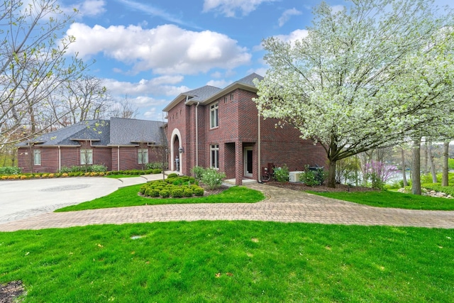 5001 Forest Vly, Clarkston, MI 48348 - view of front of home featuring brick siding and a front yard
