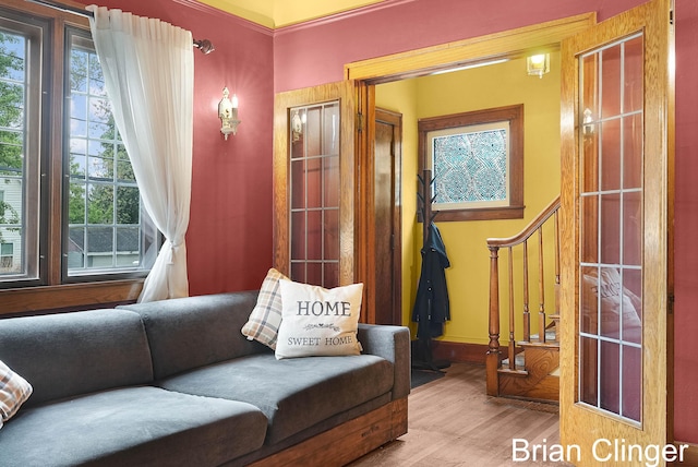 117 Palmer St NE, Grand Rapids, MI 49505 - sitting room with wood finished floors, stairs, and baseboards