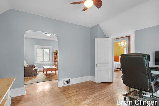 117 Palmer St NE, Grand Rapids, MI 49505 - office area featuring lofted ceiling, light wood finished floors, ceiling fan, arched walkways, and baseboards
