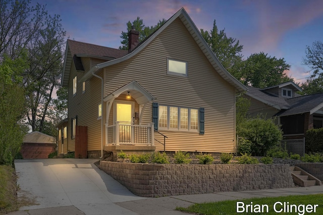 117 Palmer St NE, Grand Rapids, MI 49505 - view of front of property with a chimney and an outdoor structure
