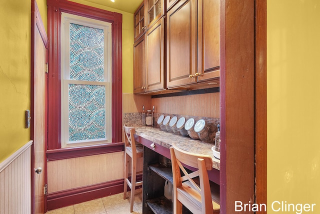 117 Palmer St NE, Grand Rapids, MI 49505 - office area featuring wainscoting and light tile patterned floors