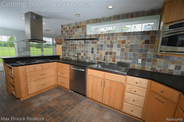 58282 Savage Rd, Vandalia, MI 49095 - kitchen with appliances with stainless steel finishes, a sink, island exhaust hood, tasteful backsplash, and recessed lighting