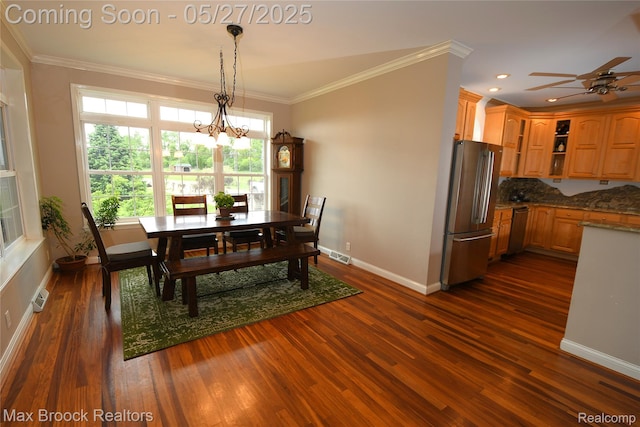 58282 Savage Rd, Vandalia, MI 49095 - dining room featuring baseboards, dark wood-type flooring, crown molding, a chandelier, and ceiling fan